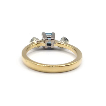 18ct yellow gold ring with a 0.35 carat topaz and 0.14 carat diamond accents, elegant jewelry piece.
