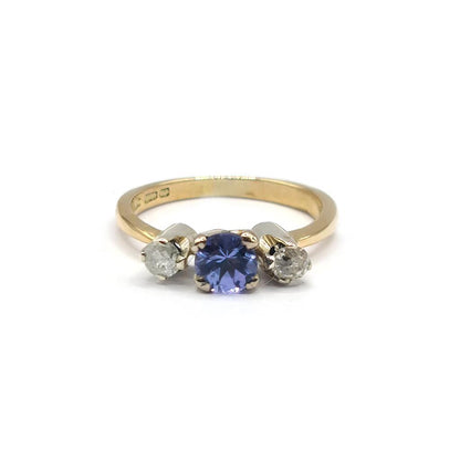18ct yellow gold ring with 0.40ct tanzanite and 0.20ct diamond accents, elegant jewelry piece featuring vibrant gemstone and gold setting