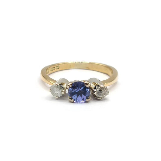 18ct yellow gold ring with 0.40ct tanzanite and 0.20ct diamond accents, elegant jewelry piece featuring vibrant gemstone and gold setting