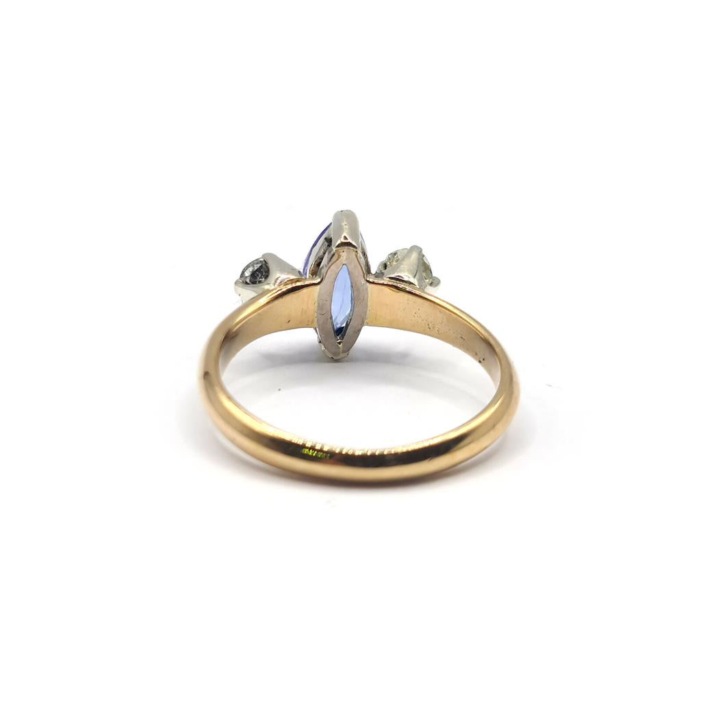 18ct yellow gold ring with 0.50 carat tanzanite and 0.30 carat diamond accents, showcasing a stunning gemstone design.