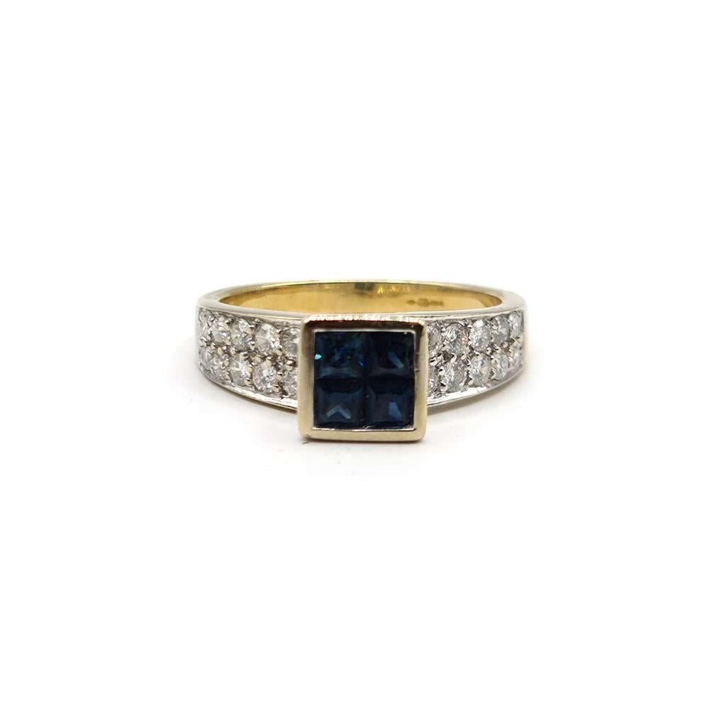 18ct yellow gold sapphire and diamond ring, size N, featuring a central 0.60 carat sapphire and sparkling diamonds.