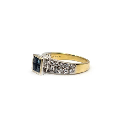 18ct yellow gold sapphire and diamond ring, size N, featuring a central blue sapphire and sparkling diamonds.