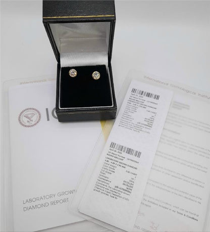 18ct yellow gold lab diamond earrings with 0.84ct diamonds, color E, VS1 clarity, certified by IGI, elegant and sparkling jewelry.