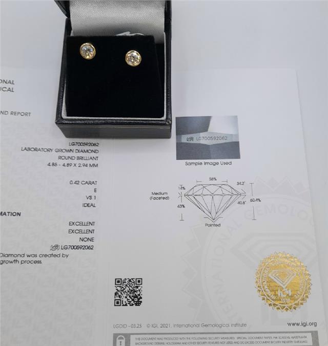 18ct yellow gold lab diamond earrings with 0.84ct, color E, VS1 clarity, featuring sparkling diamonds and a classic design.