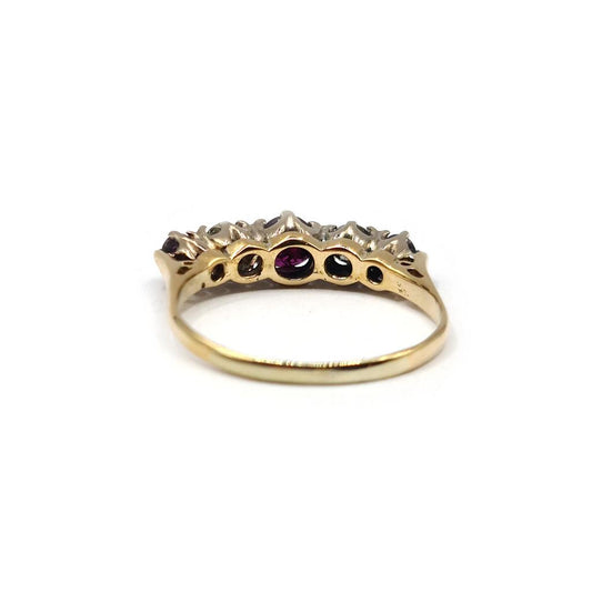 18ct yellow gold ring featuring a 0.85 carat ruby and 0.44 carat diamond, showcasing elegant gemstone detailing.