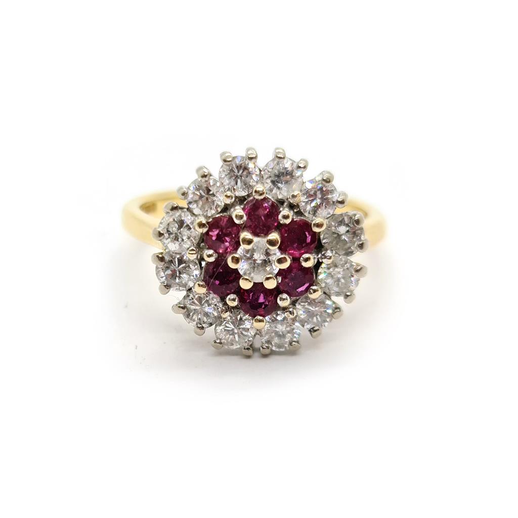 18ct yellow gold ring featuring 1.18ct diamonds and 0.36ct rubies, size K, elegant jewelry piece with gemstone accents.