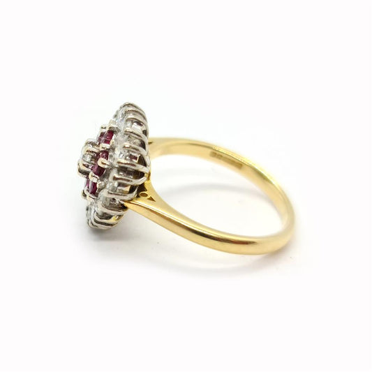 18ct yellow gold ring with 1.18ct diamond and 0.36ct ruby, size K, featuring a elegant and sparkling gemstone design.
