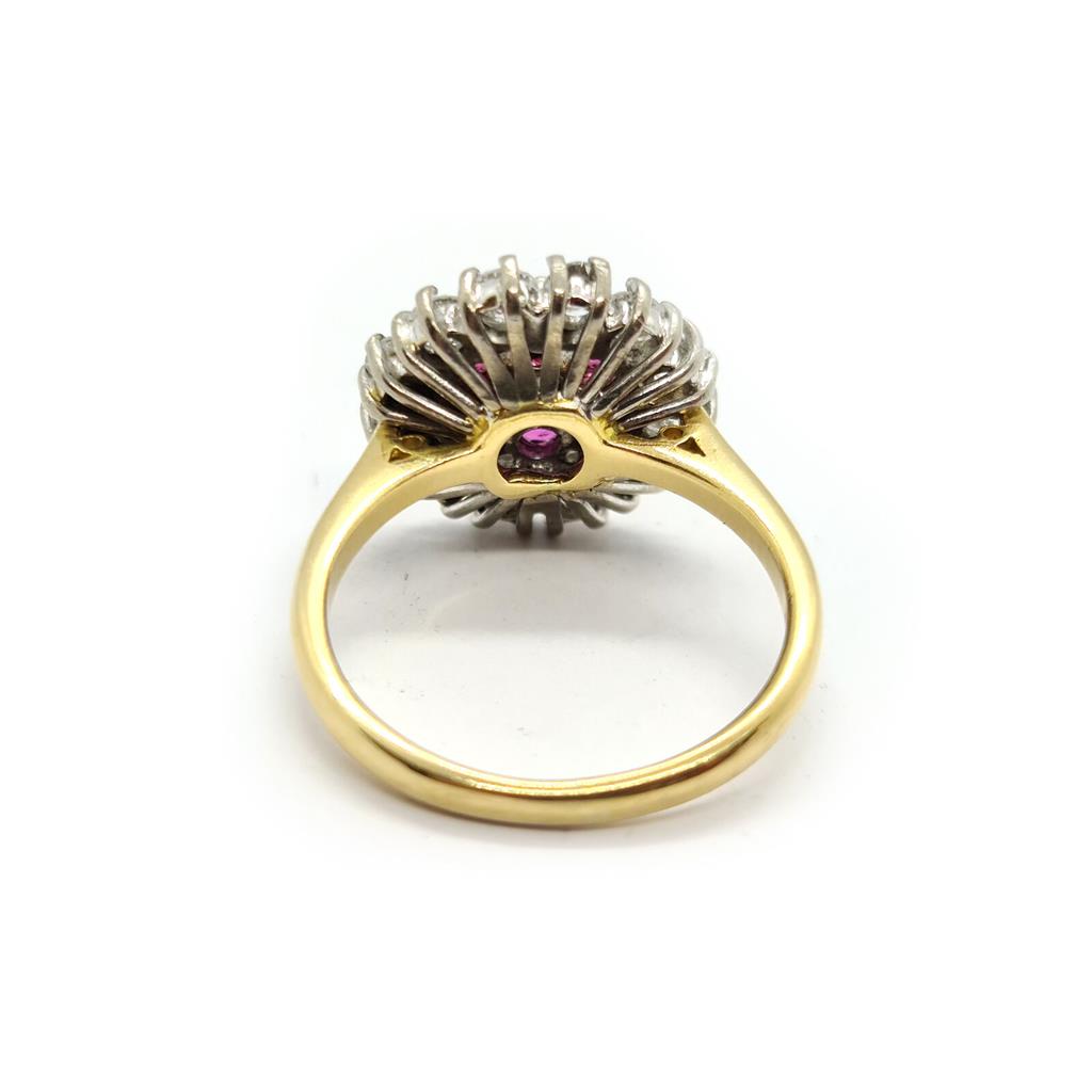 18ct yellow gold ring with 1.18ct diamonds and 0.36ct rubies, size K, featuring a elegant gemstone design.