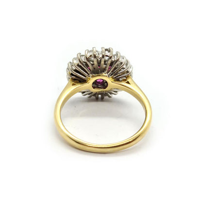 18ct yellow gold ring with 1.18ct diamonds and 0.36ct rubies, size K, featuring a elegant gemstone design.