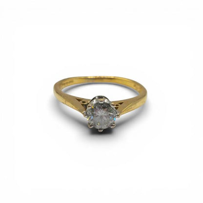 18ct yellow gold diamond ring with 1/2 carat total weight, featuring sparkling diamonds and a sleek, elegant design.
