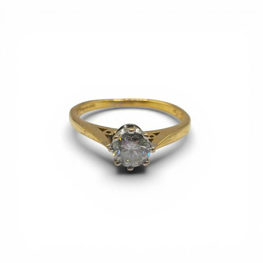 18ct yellow gold diamond ring with 1/2 carat total weight, featuring sparkling diamonds and a sleek, elegant design.
