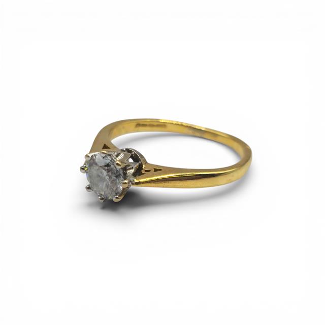 18ct yellow gold diamond ring with 1/2 carat total weight, featuring a sleek design and sparkling diamonds.