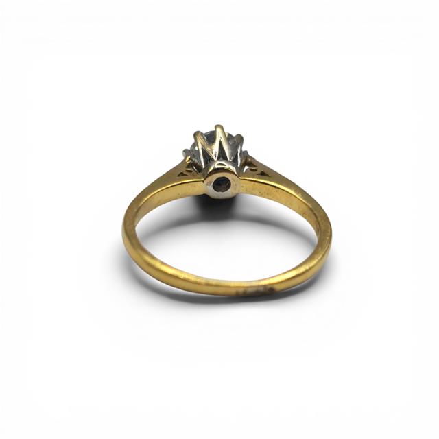18ct yellow gold diamond ring with 1/2 carat total weight, featuring sparkling diamonds and a sleek, elegant design.