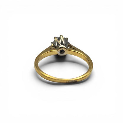 18ct yellow gold diamond ring with 1/2 carat total weight, featuring sparkling diamonds and a sleek, elegant design.