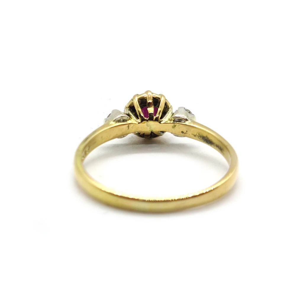 18ct yellow gold ring with a 1.45 carat garnet and 0.30 carat diamond accents, showcasing an elegant jewelry design.