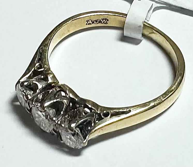 18ct yellow gold ring with three diamonds, size K, unbranded jewelry, showcasing a classic and elegant design.