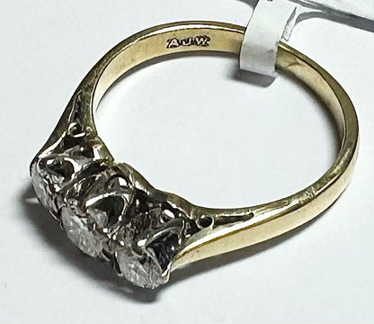 18ct yellow gold ring with three diamonds, size K, unbranded jewelry, showcasing a classic and elegant design.
