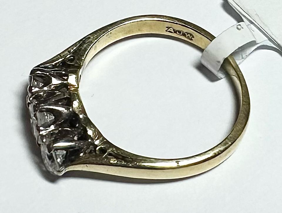 18ct yellow gold ring with three diamonds, size K, featuring a classic design and elegant craftsmanship.