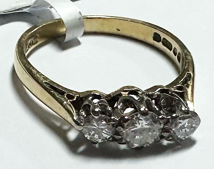 18ct yellow gold ring with three diamonds, size K, featuring a classic and elegant design.