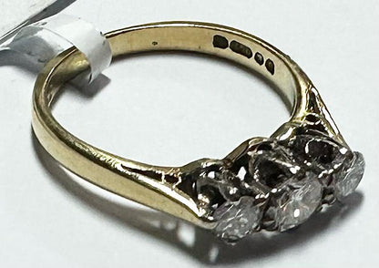 18ct yellow gold ring with three diamonds, size K, showcasing a elegant and classic design.