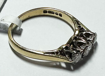 18ct yellow gold ring with three diamonds, size K, featuring a classic design and sparkling gemstone accents.