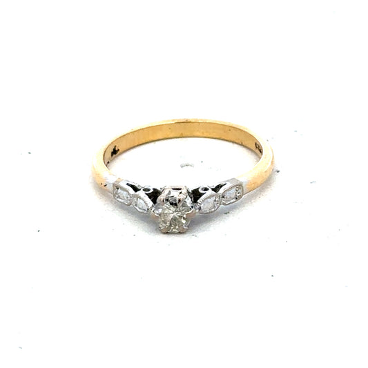 18ct yellow gold and platinum diamond ring, size M, featuring sparkling diamonds and a sleek band design.