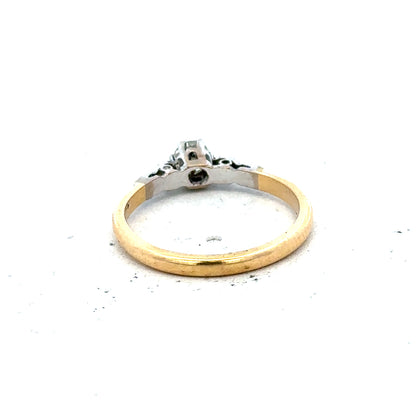 18ct yellow gold and platinum diamond ring, size M, featuring a detailed band with sparkling diamonds.