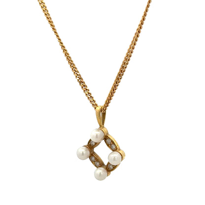 18ct yellow gold chain with pendant, unbranded, weighing 4.3g, featuring a detailed gold pendant visible in the image.