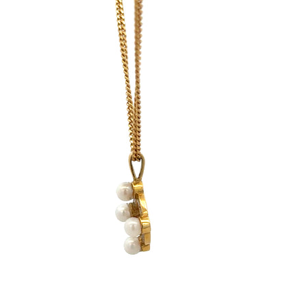 18ct yellow gold chain with pendant, unbranded, weighs 4.3g, featuring a detailed gold pendant design.