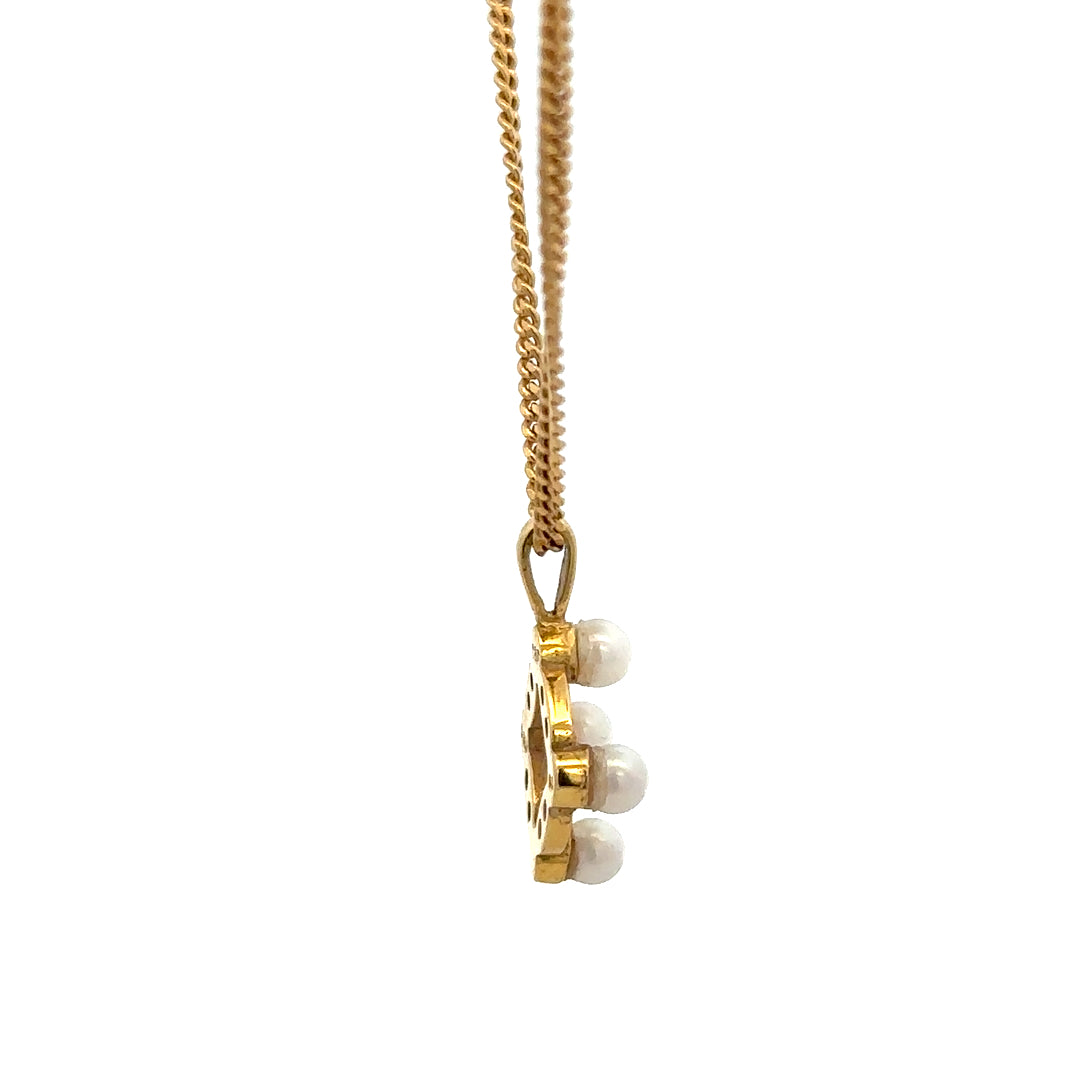 18ct yellow gold chain with pendant, unbranded, weighing 4.3g, featuring a detailed gold pendant on a delicate chain.