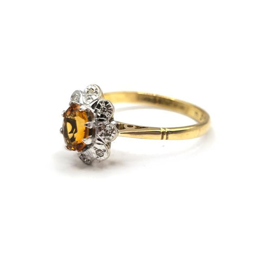18ct yellow gold citrine and diamond ring, featuring a large central citrine gemstone with diamond accents, unbranded jewelry.