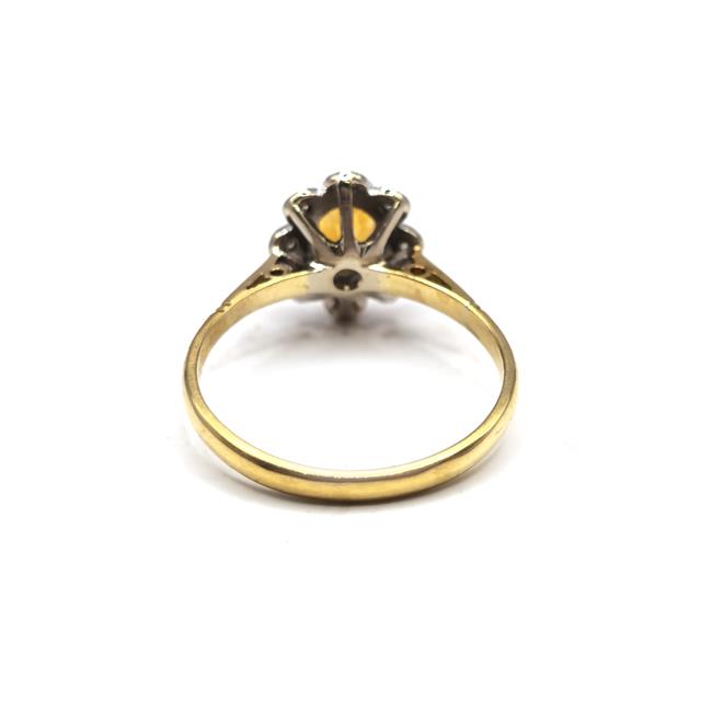 18ct yellow gold citrine and diamond ring with a central citrine gemstone and diamond accents, unbranded jewelry ring.