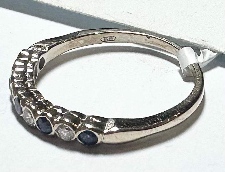 18ct yellow gold diamond and sapphire ring in size M, featuring a sparkling diamond and vibrant sapphires on an elegant band.