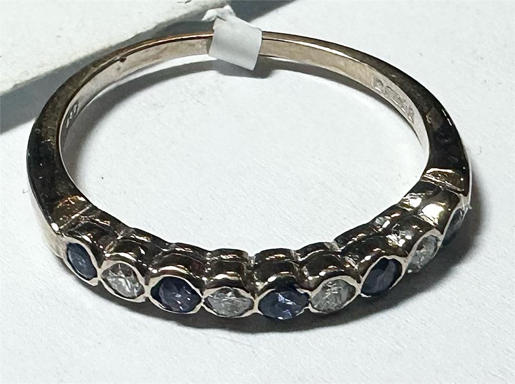 18ct yellow gold diamond and sapphire ring in size M, featuring a sparkling gemstone design.