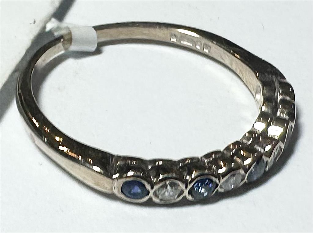 18ct yellow gold diamond and sapphire ring in size M, featuring a sparkling gemstone design.