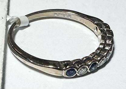 18ct yellow gold diamond and sapphire ring in size M, featuring sparkling gemstones and elegant design.