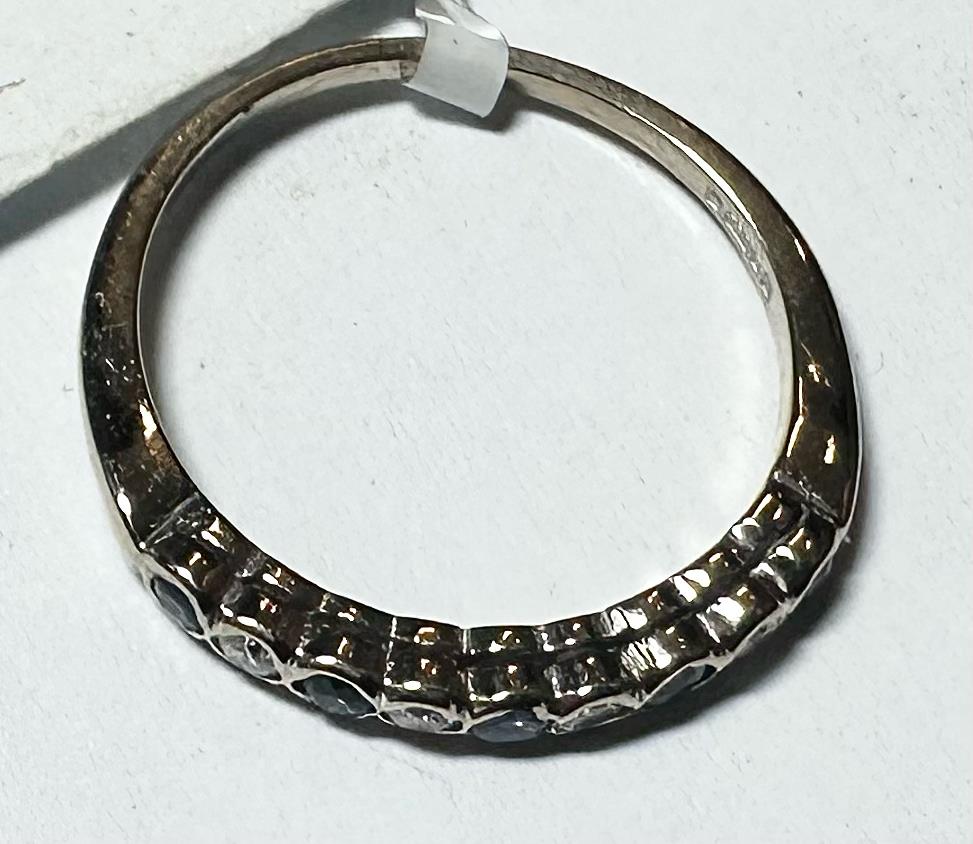 18ct yellow gold diamond and sapphire ring, size M, featuring a sparkling gemstone design.