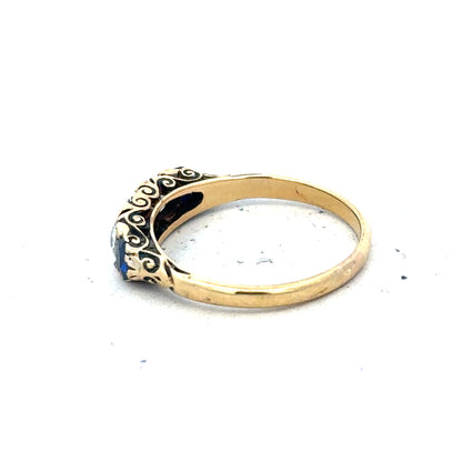 18ct yellow gold diamond and sapphire ring in size O 1/2, featuring sparkling gemstones and elegant design.