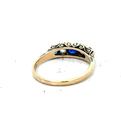 18ct yellow gold diamond and sapphire ring in size O 1/2, featuring sparkling stones and elegant design.