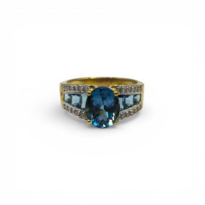 18ct yellow gold diamond and topaz ring with sparkling gemstones, showcasing an elegant design.