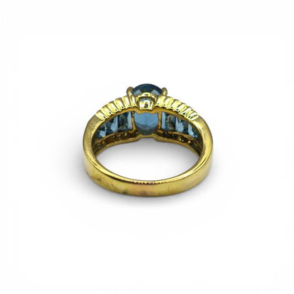 18ct yellow gold diamond and topaz ring featuring sparkling stones and elegant design, perfect for special occasions