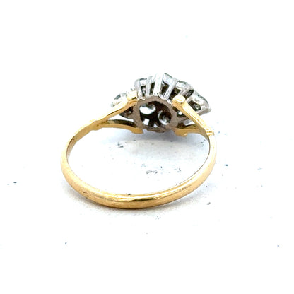 18ct yellow gold diamond cluster ring with multiple sparkling diamonds arranged in a luxurious design.