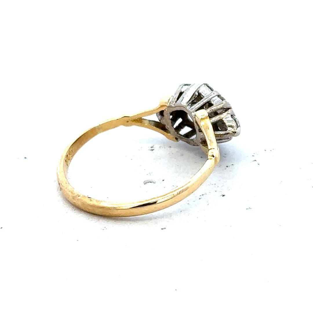 18ct yellow gold diamond cluster ring with sparkling diamonds set in a stylish gold band.