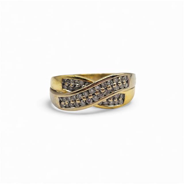 18ct yellow gold diamond crossover ring featuring sparkling diamonds and an elegant design, unbranded jewelry accessory.