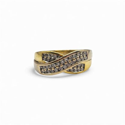 18ct yellow gold diamond crossover ring featuring sparkling diamonds and an elegant design, unbranded jewelry accessory.
