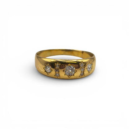 18ct yellow gold diamond ring with a sparkling central diamond and elegant band, unbranded jewelry for special occasions.