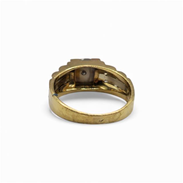 18ct yellow gold diamond ring with sparkling diamonds, showcasing elegant jewelry design and craftsmanship.