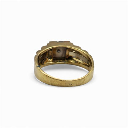 18ct yellow gold diamond ring with sparkling diamonds, showcasing elegant jewelry design and craftsmanship.