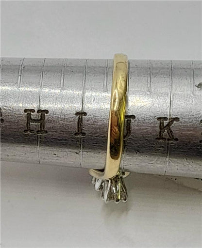 18ct yellow gold diamond ring in size J with 2.4g weight, featuring sparkling diamonds and a classic design.