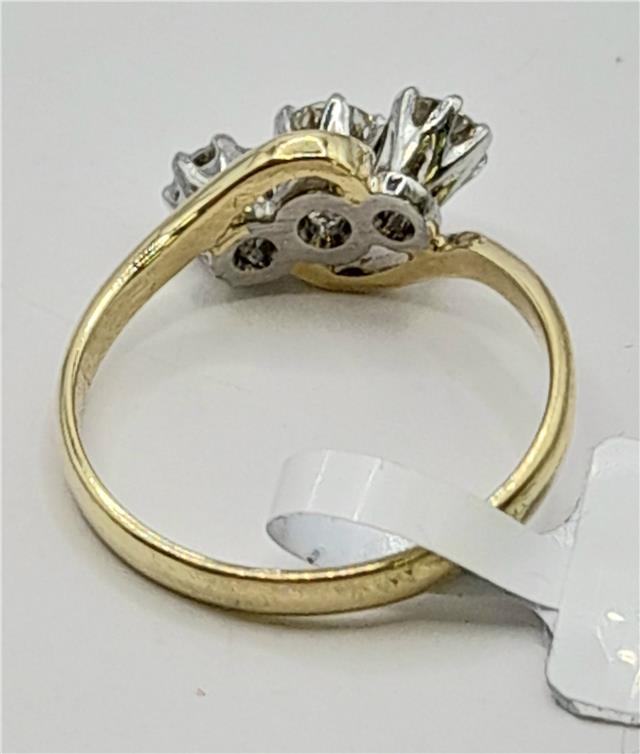 18ct yellow gold diamond ring with a size J, featuring sparkling diamonds and a 2.4g weight. Unbranded jewelry accessory.